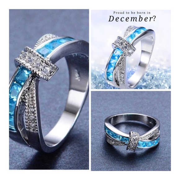 Boutique Jewelry - NEW S925 Blue Topaz Crossover Bow Ring